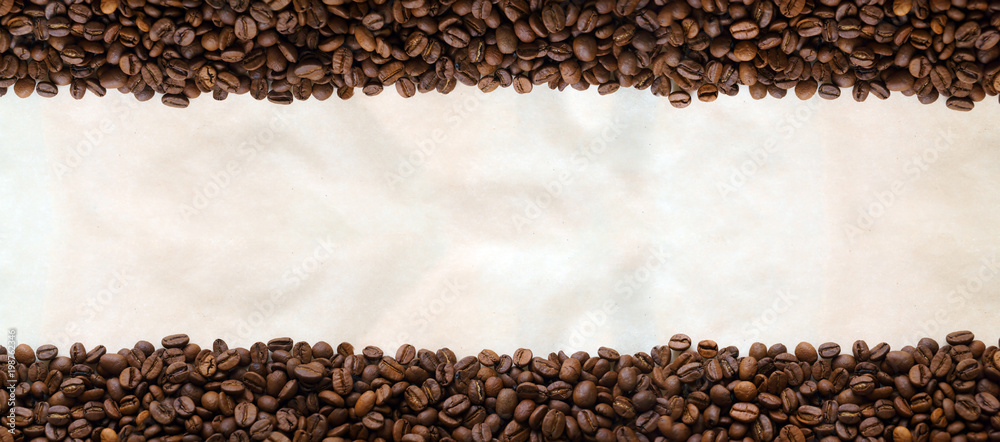Coffee beans on paper background