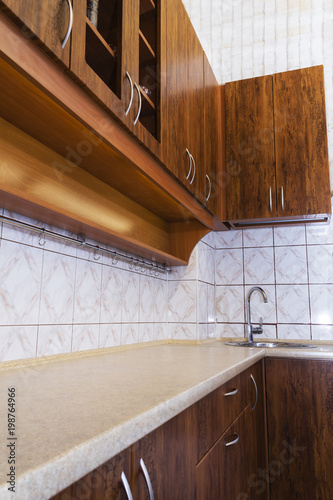 Luxury pine wood beautiful custom kitchen interior design with island and granite.