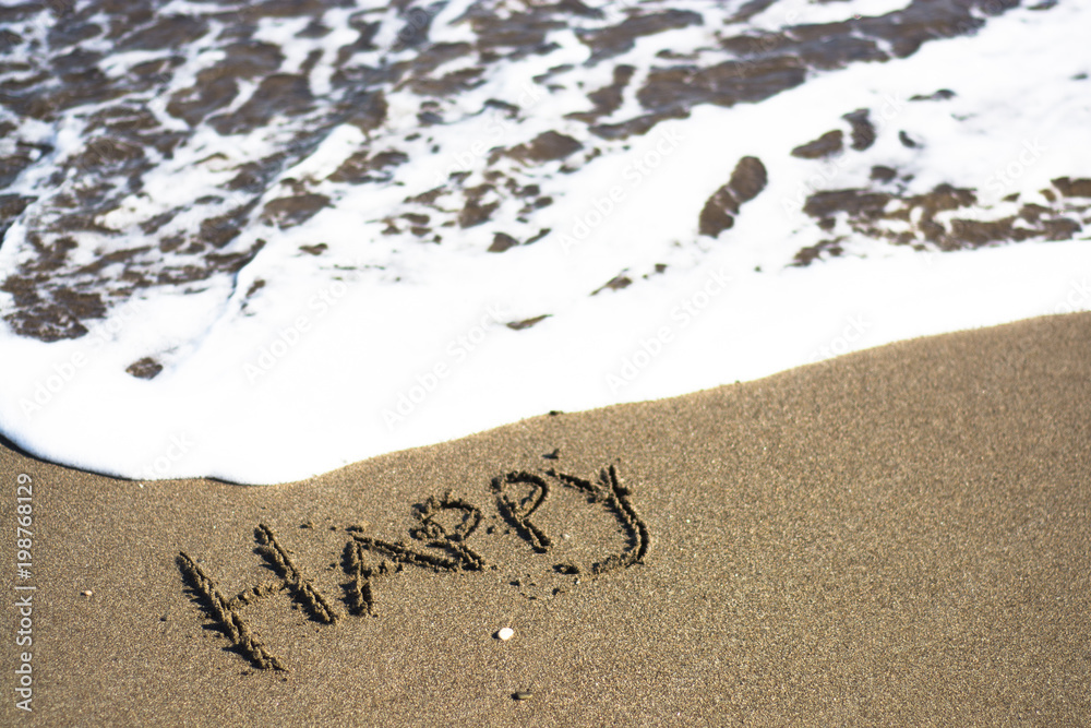 Fototapeta premium holiday writing concept on sand