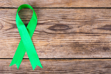 Green ribbon as symbol of awareness of the disease, World Health Day