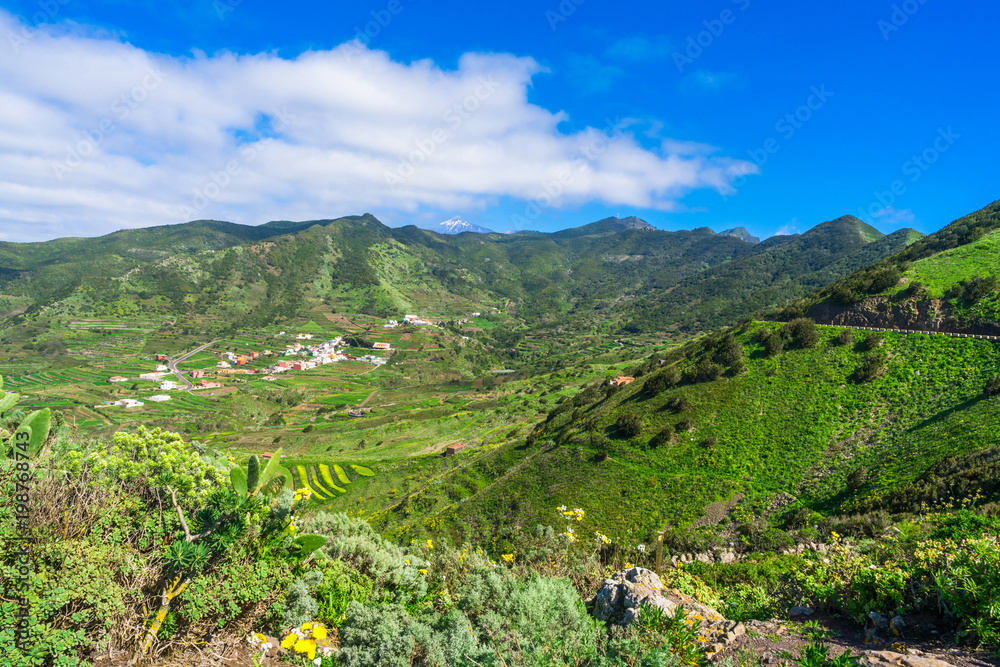 Panoramic mountain landscape with Pico del Teide peak in the distance, Tenerife; Canary Islands