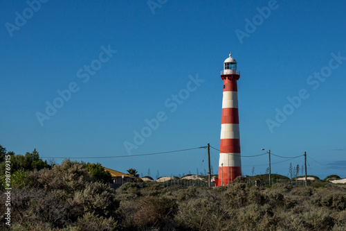 Red and white Point Moore lighthouse in Geraldton  Western Australia.