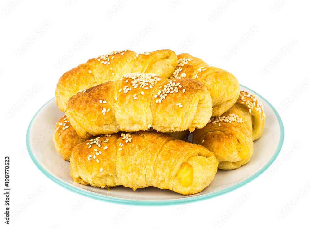 Homemade pastries with puff pastry stuffing with sesame seeds Homemade pastries with puff pastry stuffing with sesame seeds