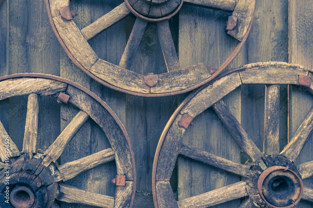 old wooden wheel, abstract background