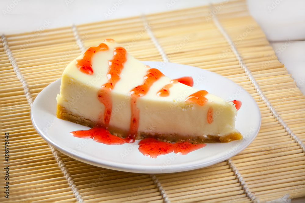 delicious cheesecake with strawberries on plate delicious cheesecake with strawberries on plate