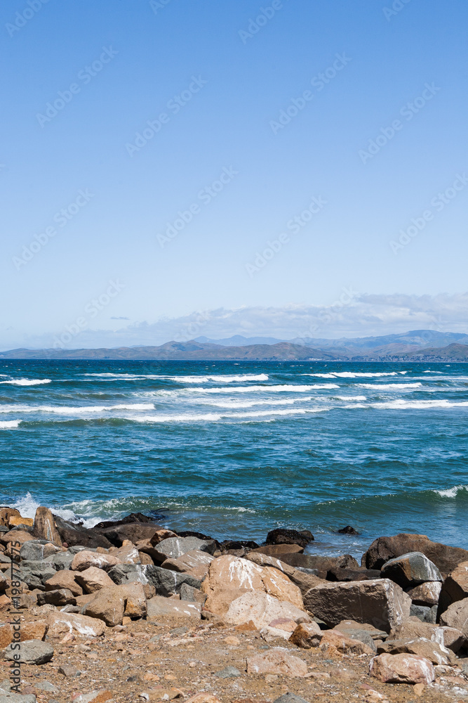 View of the Ocean Waves breaking on the Beach, in Morrow Bay, California View of the Ocean Waves breaking on the Beach, in Morrow Bay, California