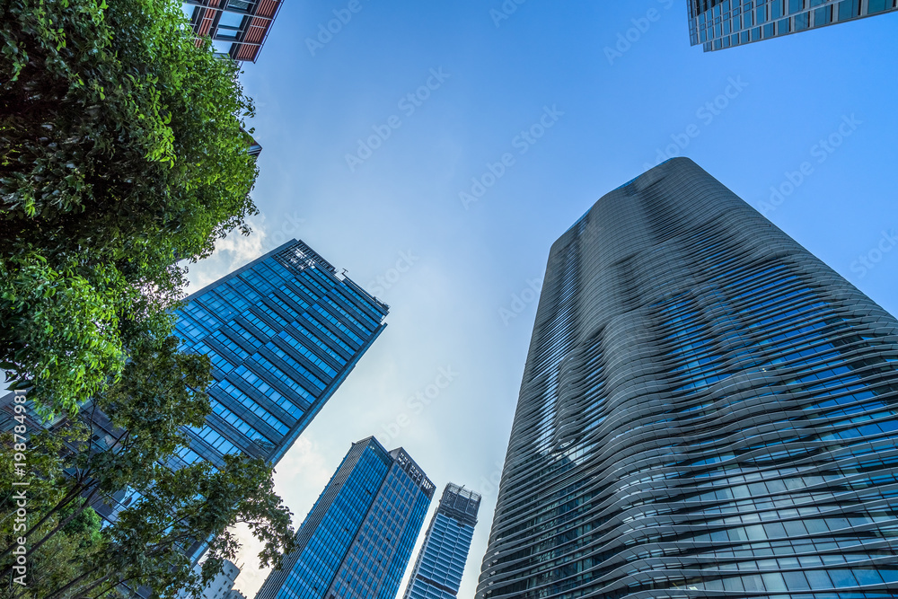 low angle view of skyscrapers in city of China. low angle view of skyscrapers in city of China.