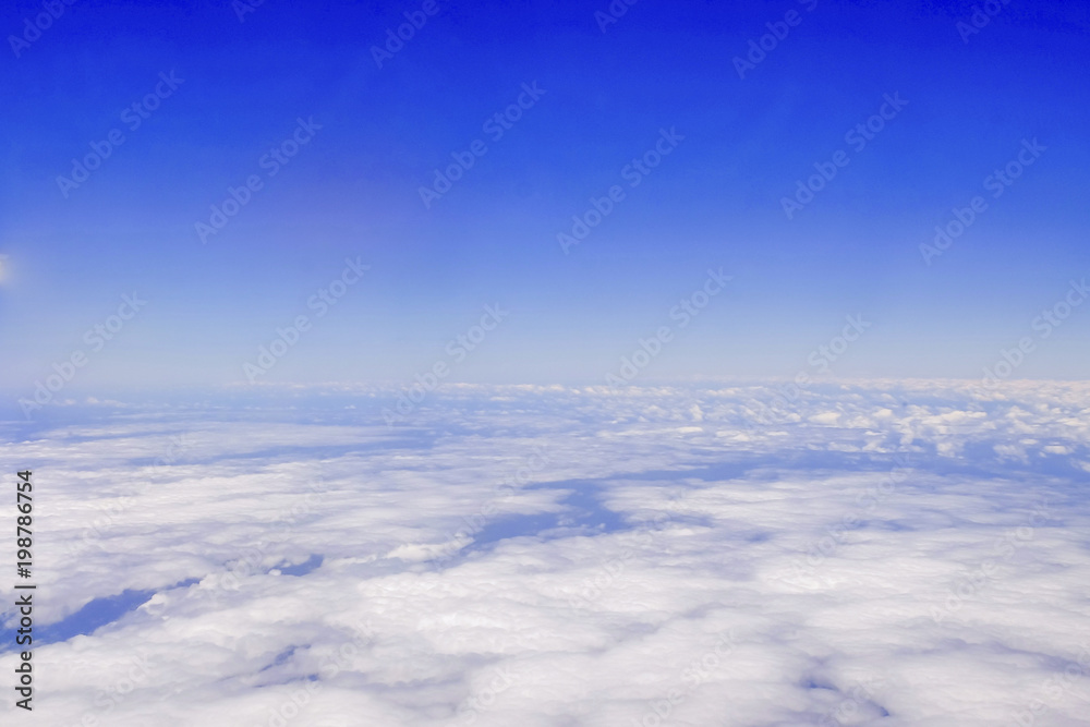 White clouds, view from above air plane window