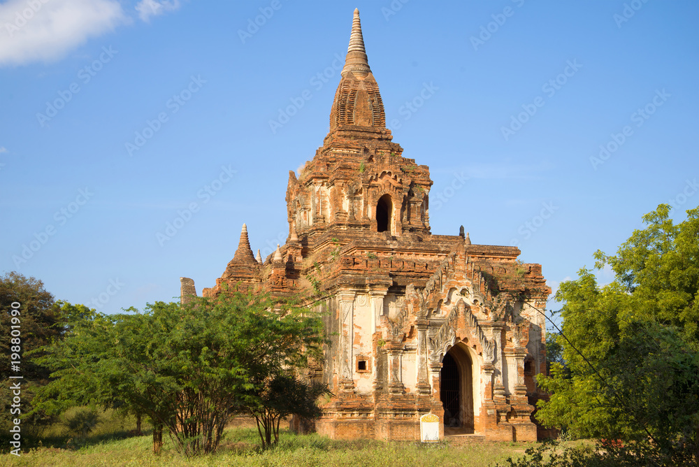 One of the Buddhist temples of ancient Bagan closeup on a Sunny day. Burma