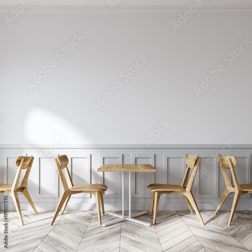 Fototapeta Naklejka Na Ścianę i Meble -  Modern white coffee shop, wooden chairs