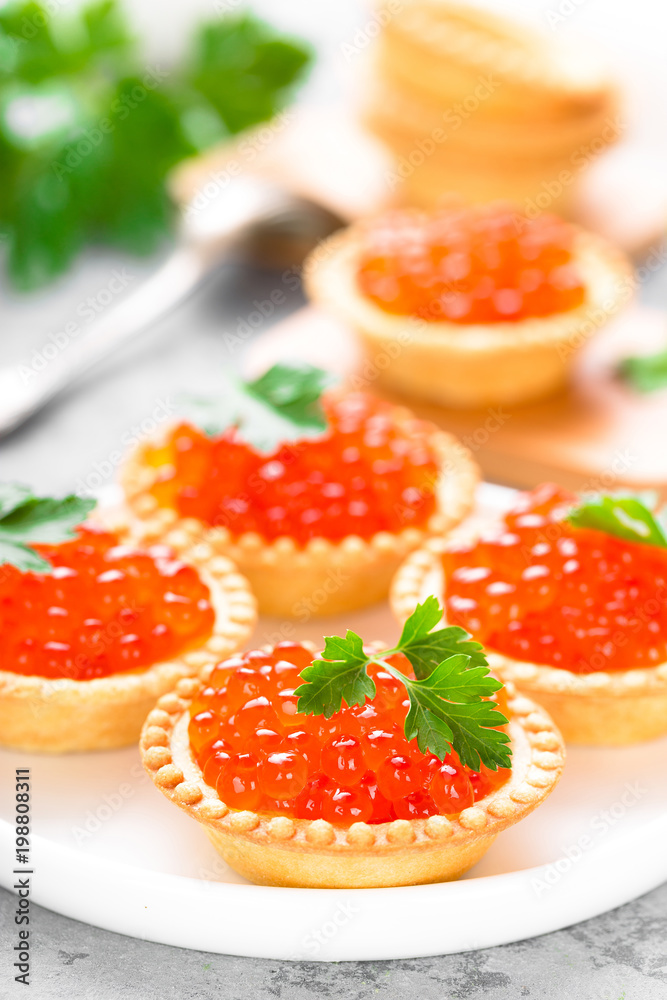 Tartlets with red salmon fish caviar, salmon caviar. Caviar