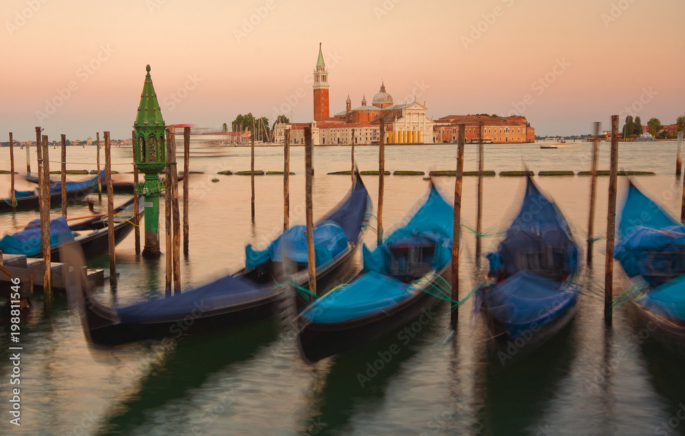 Gondola dock at sunset. Venice, Italy.