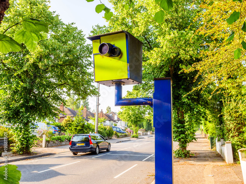 Day view UK static speed or safety camera on road photo