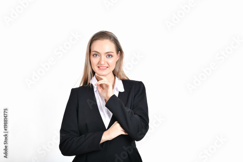 Business Concept. Beautiful businesswoman poses confidently. Beautiful young businesswoman looks charming and trustworthy. Young businesswoman has leadership on a white background.