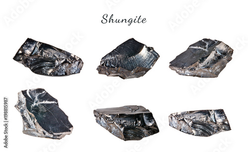 Macro shooting of natural gemstone. Raw mineral shungite. Isolated object on a white background.