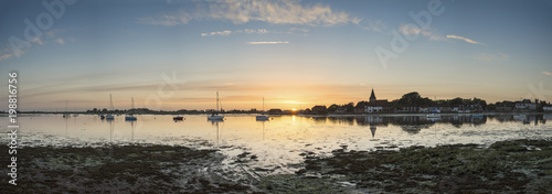 Beauitful panorama landscape over Bosham Harbour in Summer at sunset