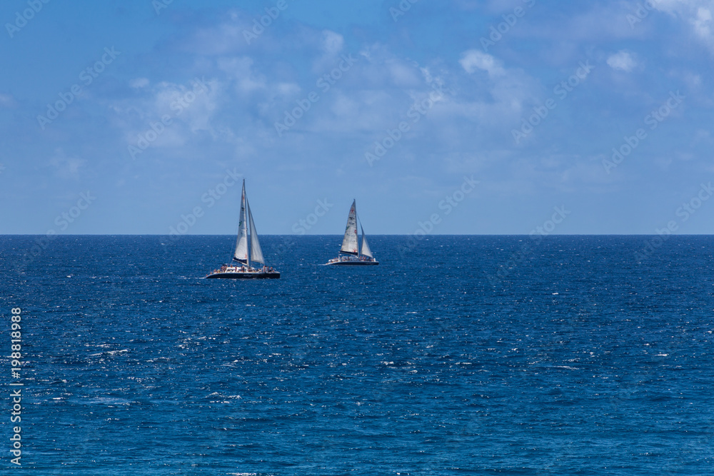 Two Sailboats on Blue