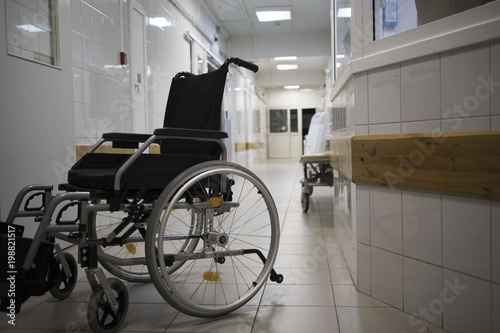 Wheel chair at corridor of hospital.