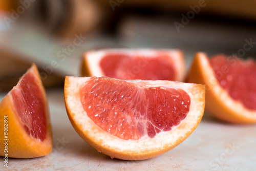 Grapefruit slices closeup. Selective focus