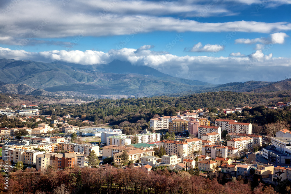 Corte, a beautiful city in the mountains on the island of Corsica, a view of the city and the mountains