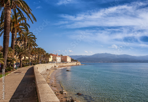 Beautiful cityscape, Ajaccio is the capital of Corsica. City on a background of snowy mountains and blue sky