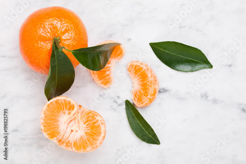 Glass  bottle of fresh mandarin tangerine juice