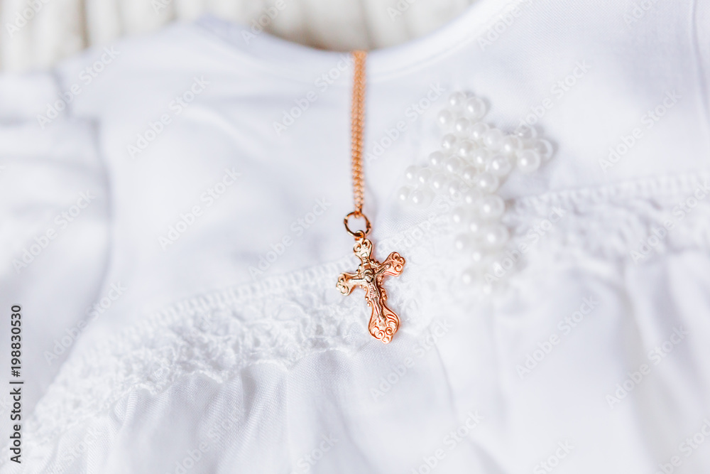 Laced dress for christening. Elegant outfit for little baby. Russian Orthodox church ceremony details. Laced dress for christening. Elegant outfit for little baby. Russian Orthodox church ceremony details.