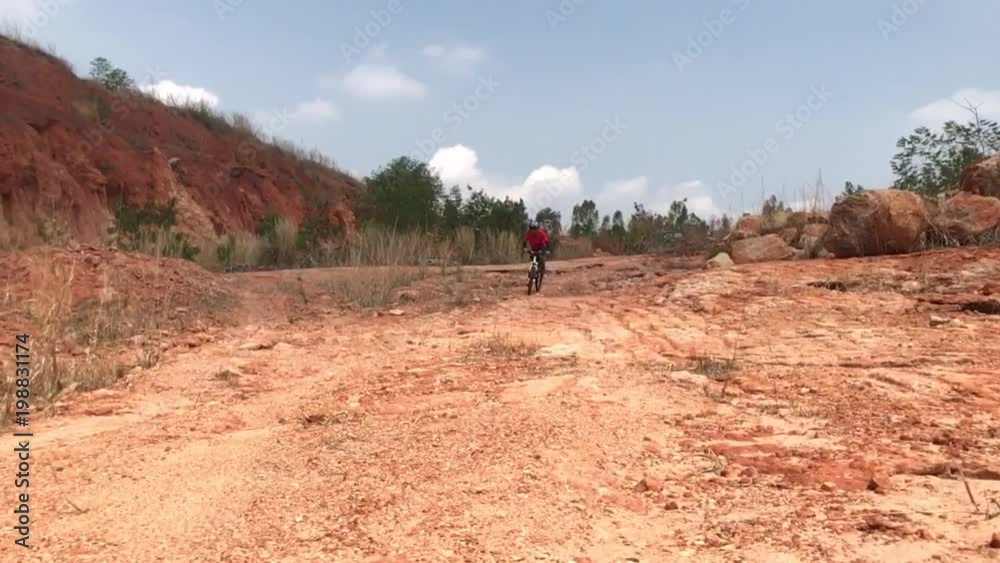 Slow motion Extreme Mountain Biking On Dirt Trail Slow motion Extreme Mountain Biking On Dirt Trail