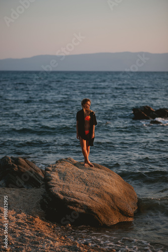 Free happy woman enjoying sunset, girl in sportswear,bikini,swimwear