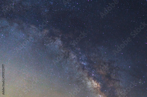 Starry night sky  Milky way galaxy with stars and space dust in the universe  Long exposure photograph  with grain.