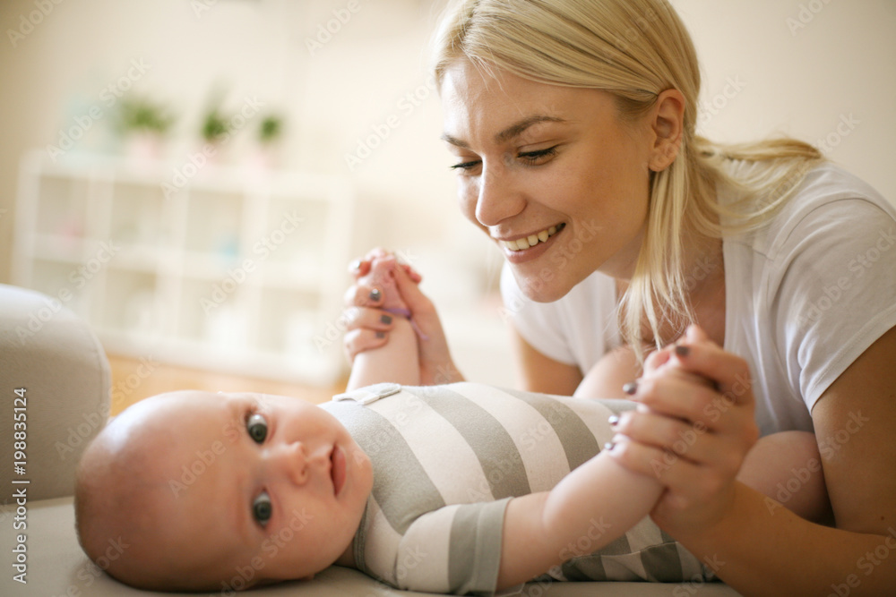 Mother with her baby boy at home. Mother with her baby boy at home.