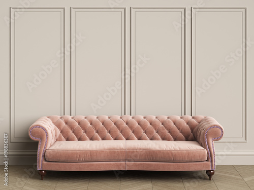 Tufted pink sofa in classic interior with copy space