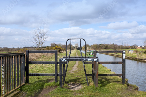 Barrier on towpath limiting vehicle and speed access in Cheshire UK