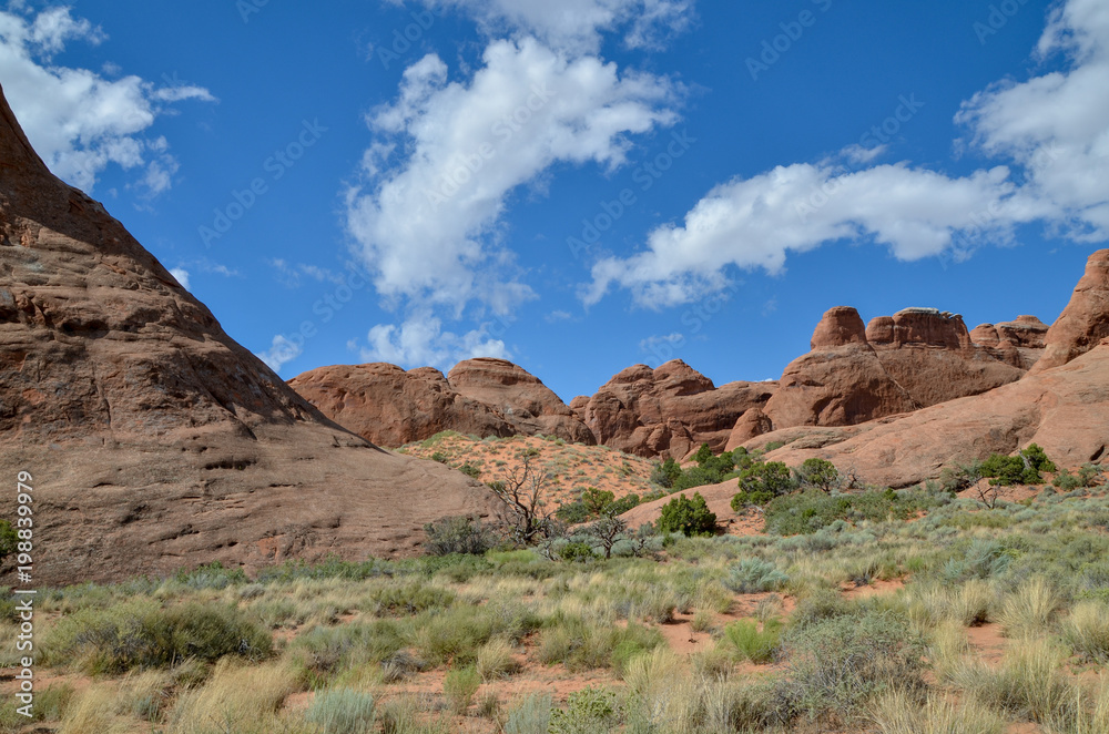 Devils Garden trail passing red sandstone formations Arches National Park, Moab, Utah Devils Garden trail passing red sandstone formations Arches National Park, Moab, Utah