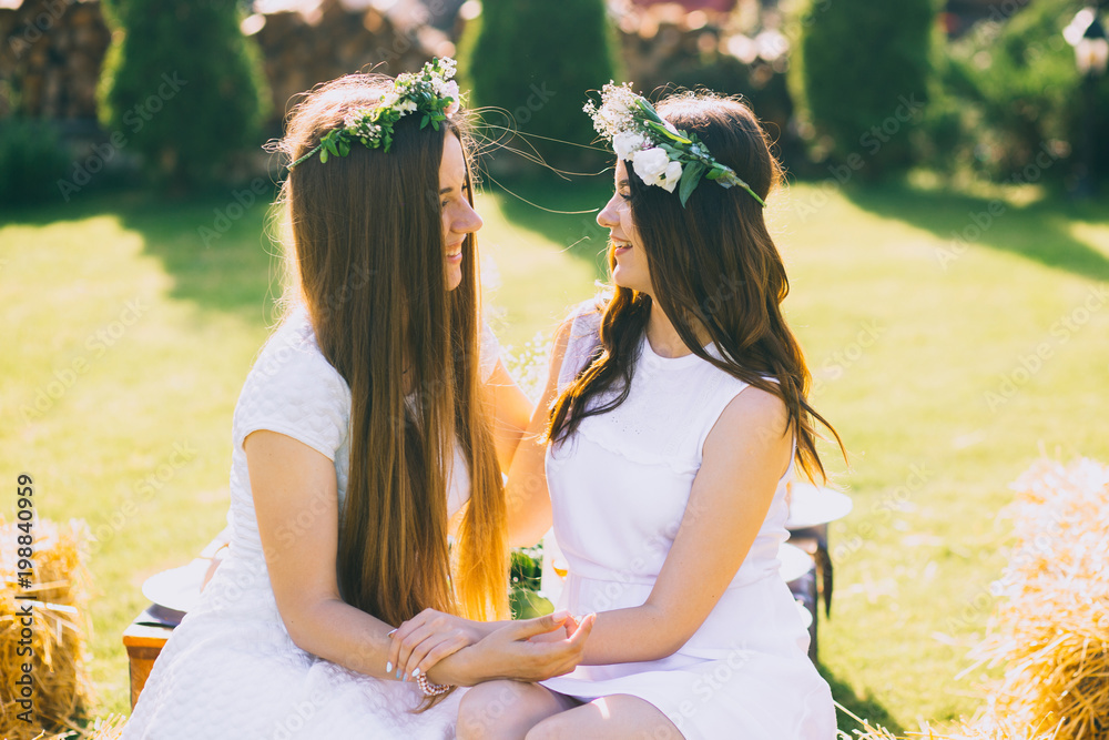 Obraz premium hen-party. Young beautiful girls having fun in the garden
