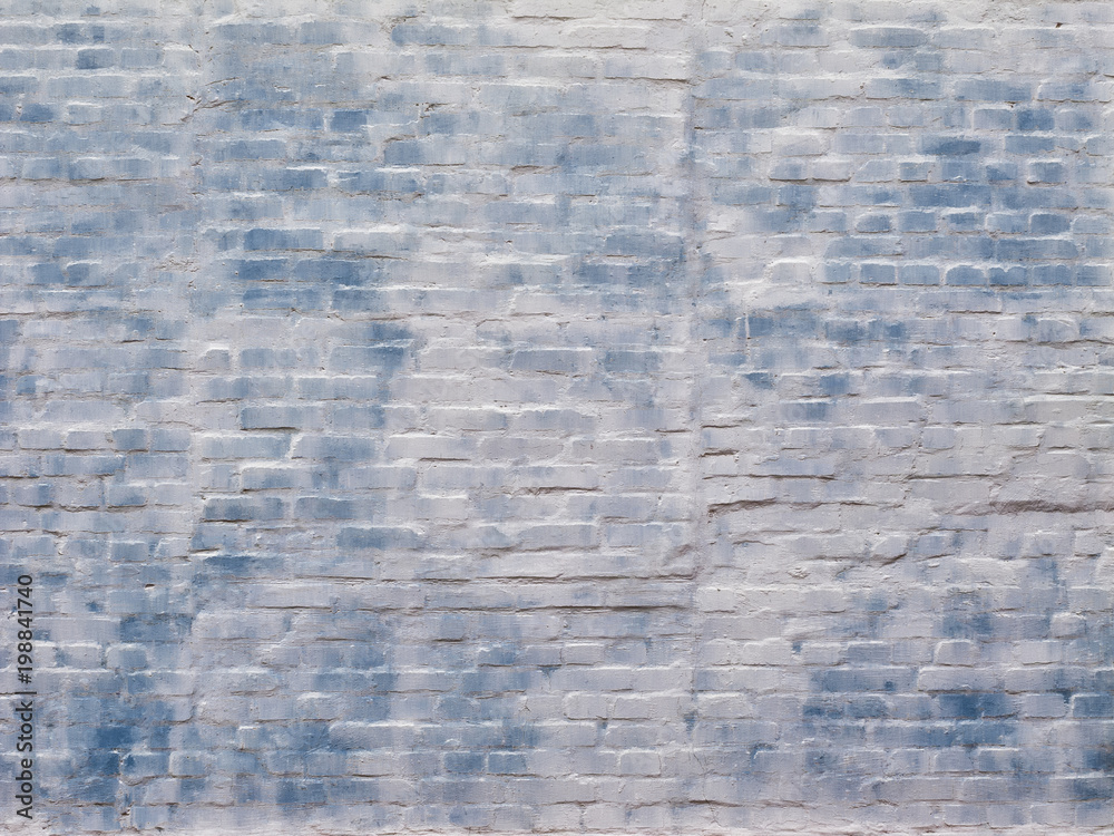 Texture, abstract background, painted white and blue color brick wall.