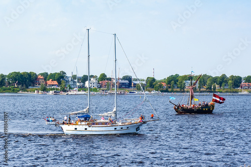 Ship floats the river Daugava
