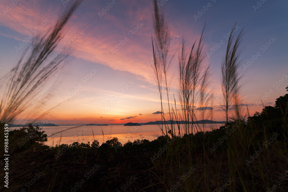 Beautiful light in the Sunset or sunrise over tropical sea scenery view high mountain background landscape.