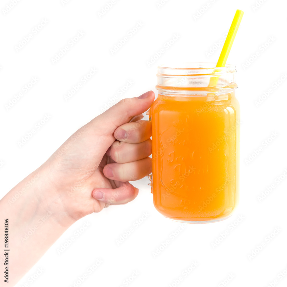 Girl child holding a jar of orange juice, concept of health Girl child holding a jar of orange juice, concept of health