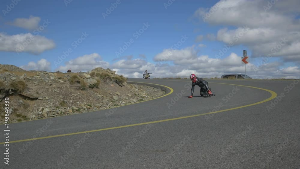Four longboarders speeding
