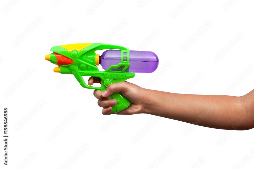 Hand holding plastic water gun isolated on white background. Objects