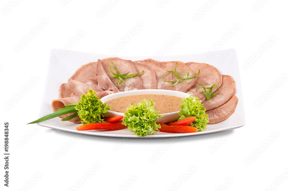 A plate with slices of sausage and meat delicacies