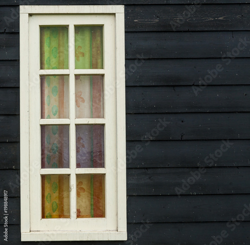 Photography Retro style, old fashioned traditional wood window and black wooden wall in Amst