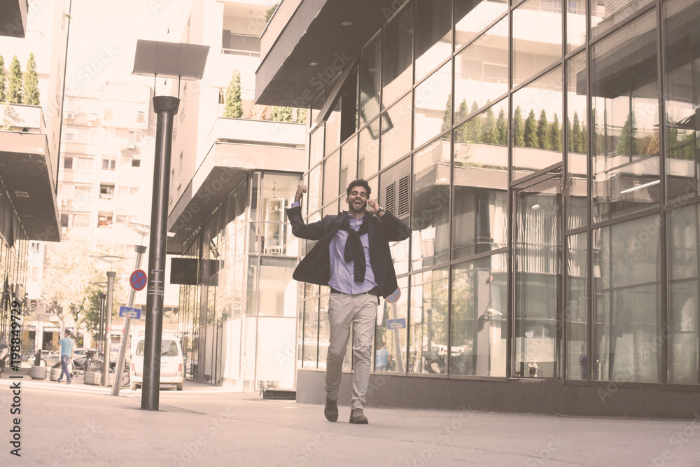 Happy businessman on street hurry on work. Happy businessman on street hurry on work.