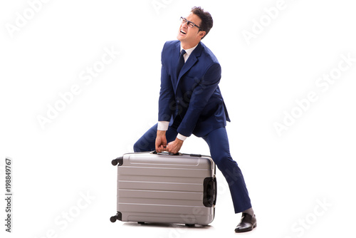 Businessman facing excess charges due to heavy suitcase photo