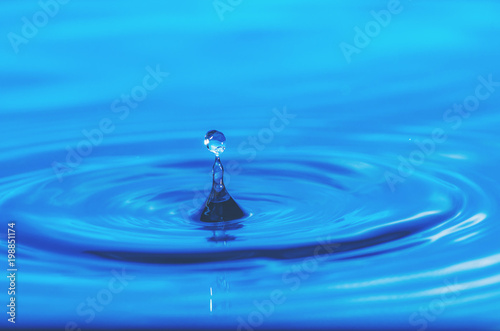 abstract background of Blue water drop falling down