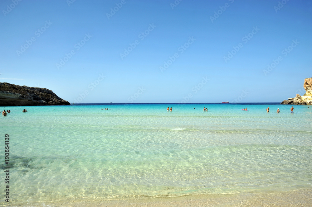 Lampedusa, Italy, August/28/2012, The Rabbit Beach, tourists in the summer Lampedusa, Italy, August/28/2012, The Rabbit Beach, tourists in the summer