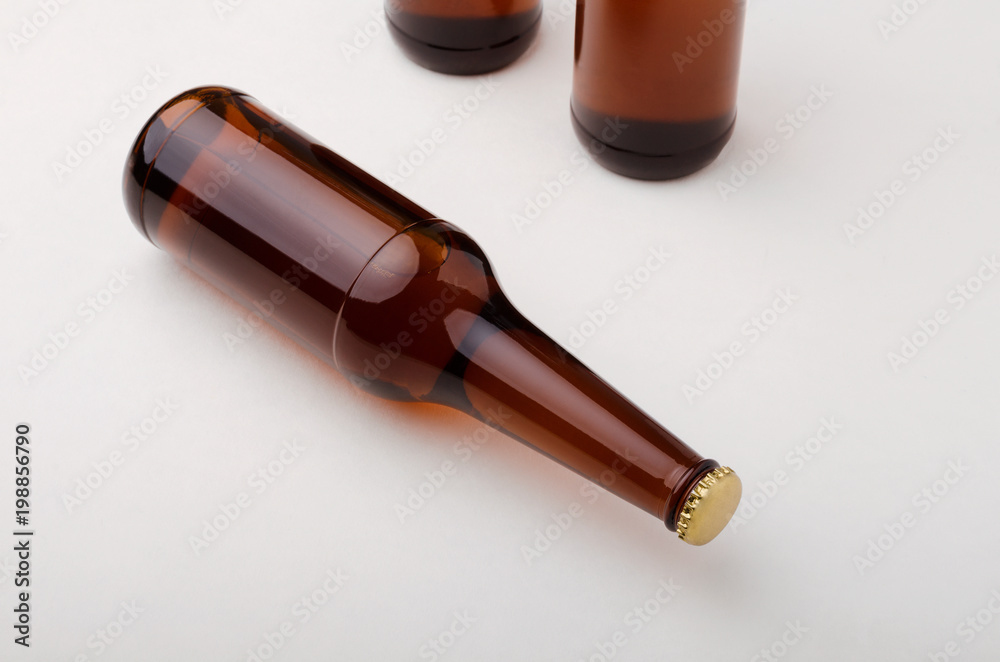 Beer bottle on white background. Cold and fresh beer concept. Beer bottle on white background. Cold and fresh beer concept.