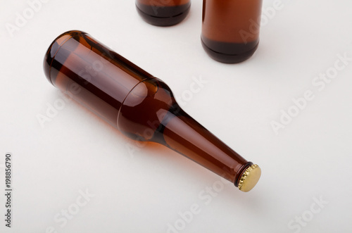 Beer bottle on white background. Cold and fresh beer concept.