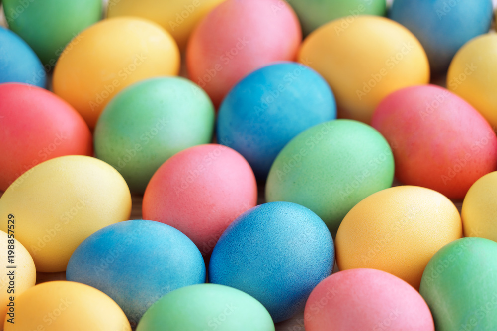 Easter background with Easter eggs and spring flowers. Top view with copy space. Easter background with Easter eggs and spring flowers. Top view with copy space.